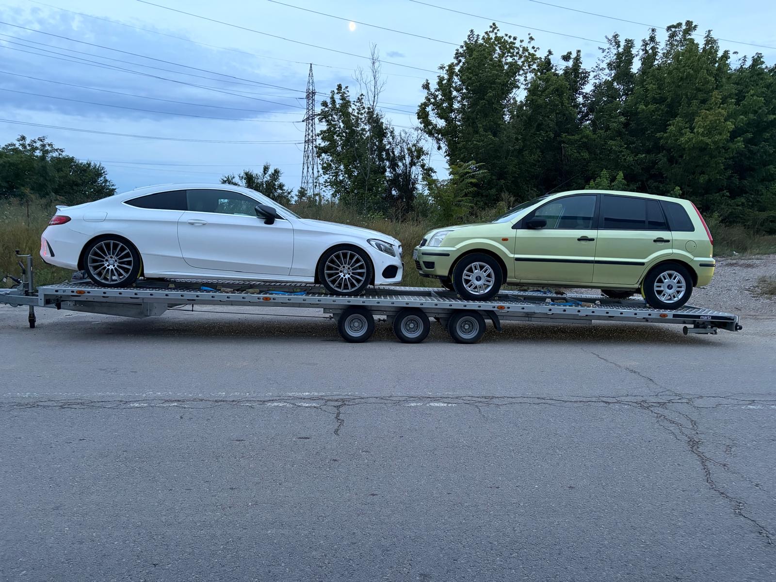 Două autoturisme pe remorcă auto — GCN Tractări Auto